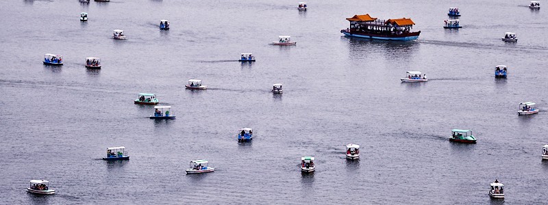 Little boats, big boat